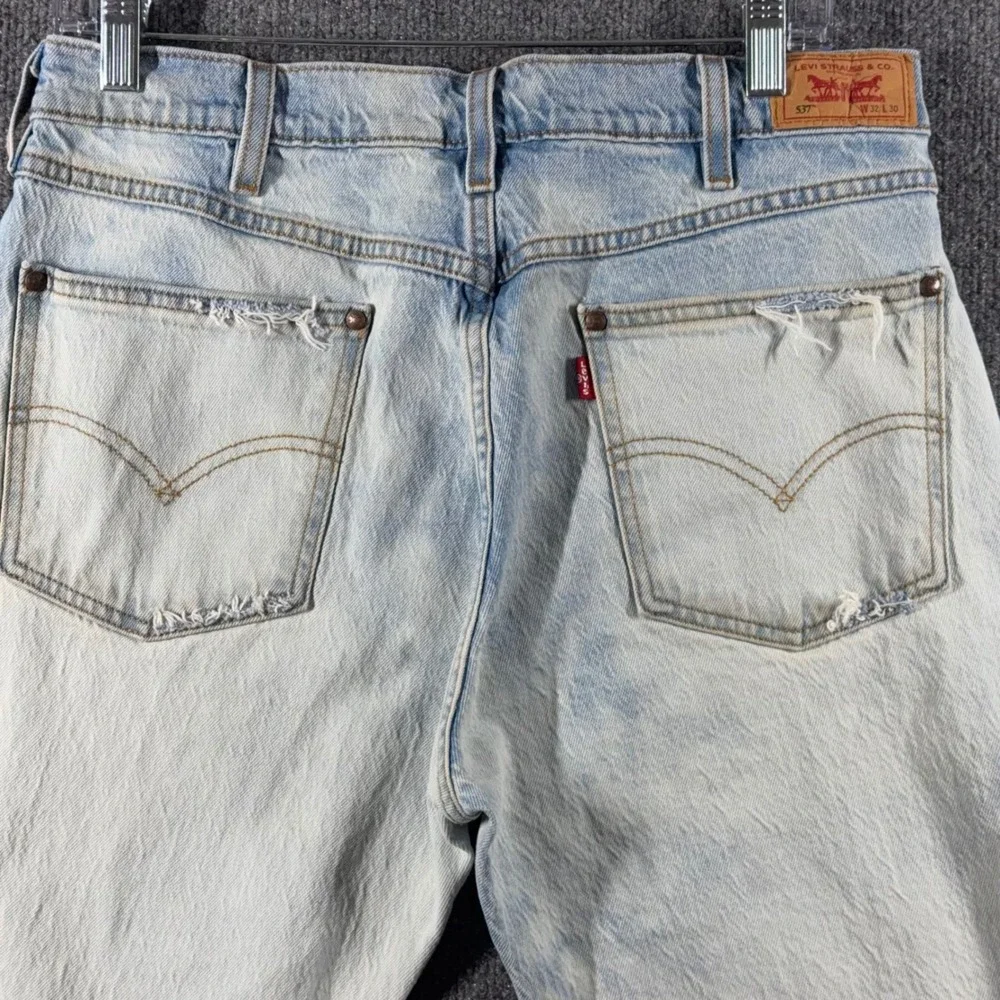 Levis 537 Jeans Mens 32x30 Western Bootcut Distressed Frayed Hem Light Rip Wash